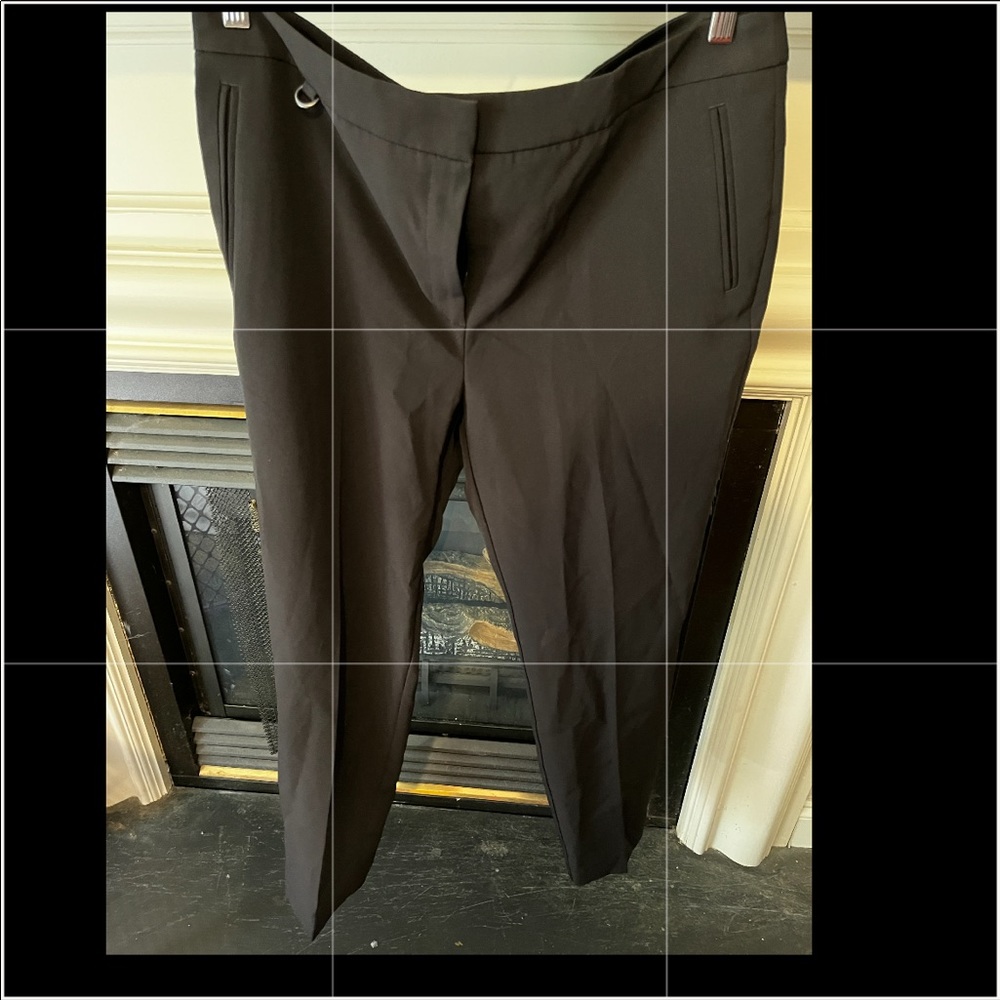 Essential black trousers, suit pants.